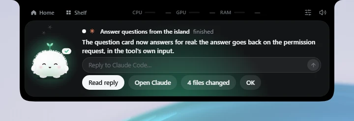A finished session card in the island with a reply box under the message, reading Reply to Claude Code with a send arrow, above the Read reply and Open Claude buttons.